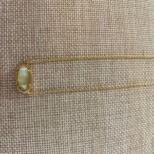 Rose gold necklace with rose gold like stone.